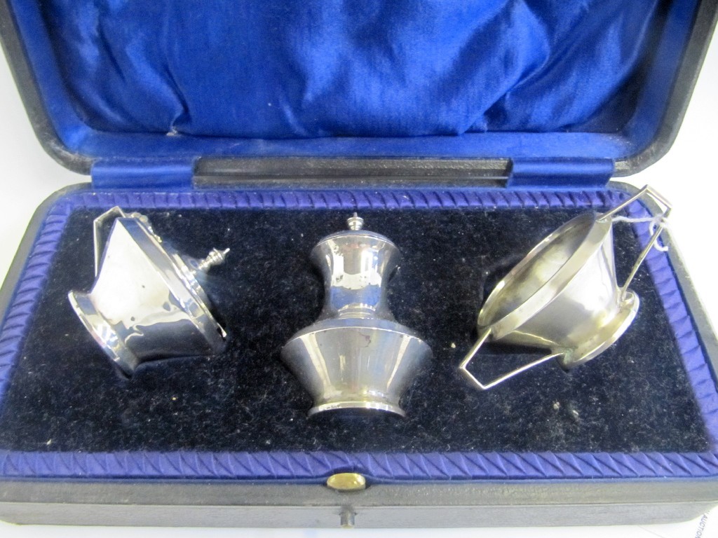 Appraisal: A cased three piece silver condiment set Birmingham