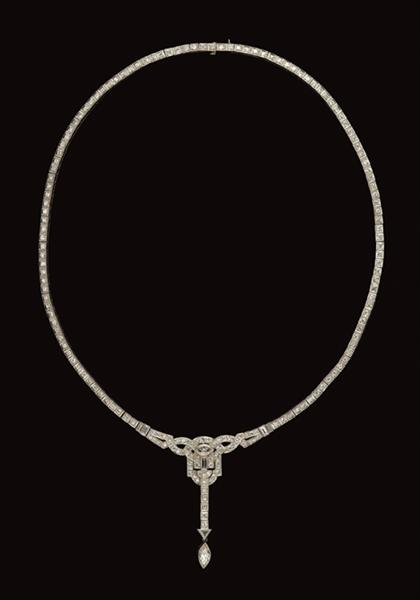 Appraisal: Platinum and diamond necklace Articulated drop pendant design with two