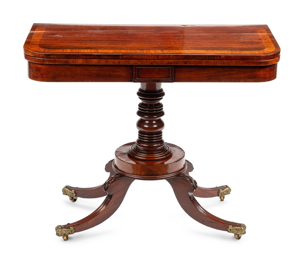 Appraisal: A Regency Crossbanded Mahogany Flip-Top Table A Regency Crossbanded Mahogany