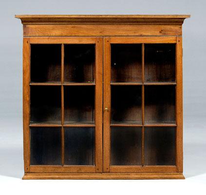 Appraisal: Southern walnut hanging cabinet walnut with poplar secondary two six-panel