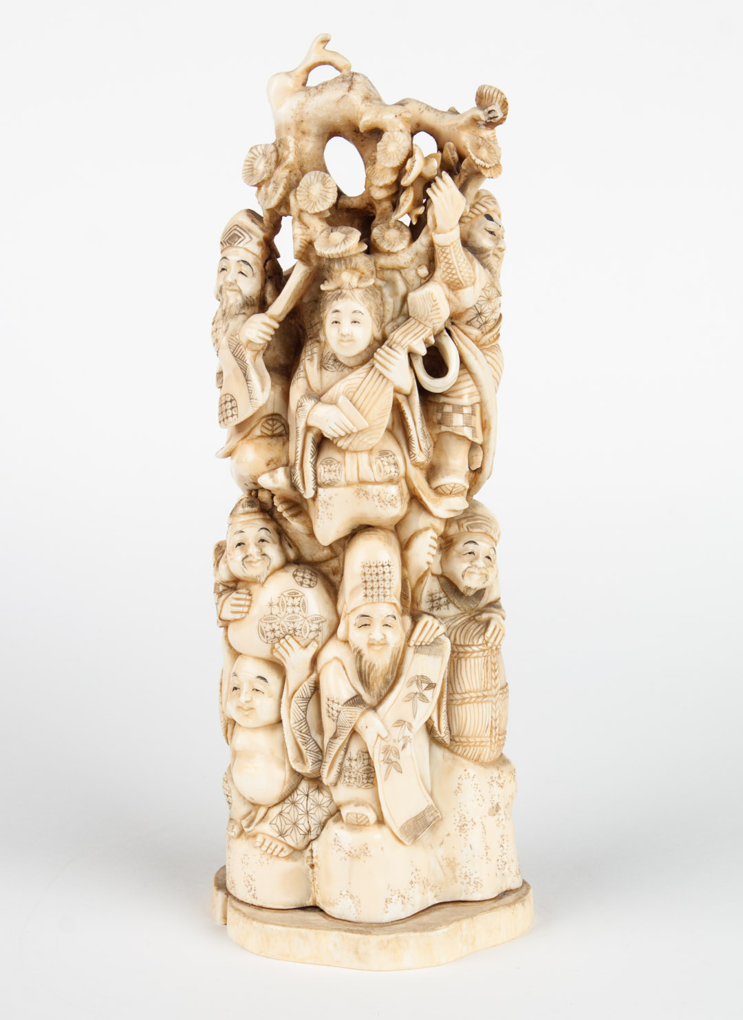 Appraisal: Japanese carved ivory seven immortals group modeled as seven figures