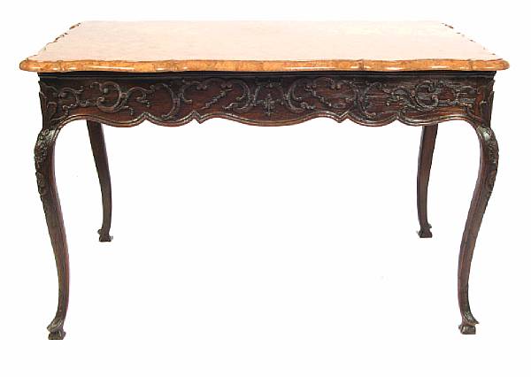 Appraisal: A Louis XV style carved oak center table height in