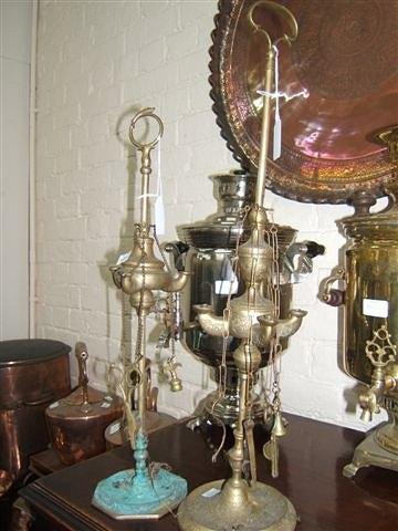 Appraisal: Two Italian brass students oil lamps one with three wicks