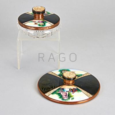 Appraisal: CONTINENTAL ENAMELED COPPER VANITY ITEMS Covered pressed glass jar and