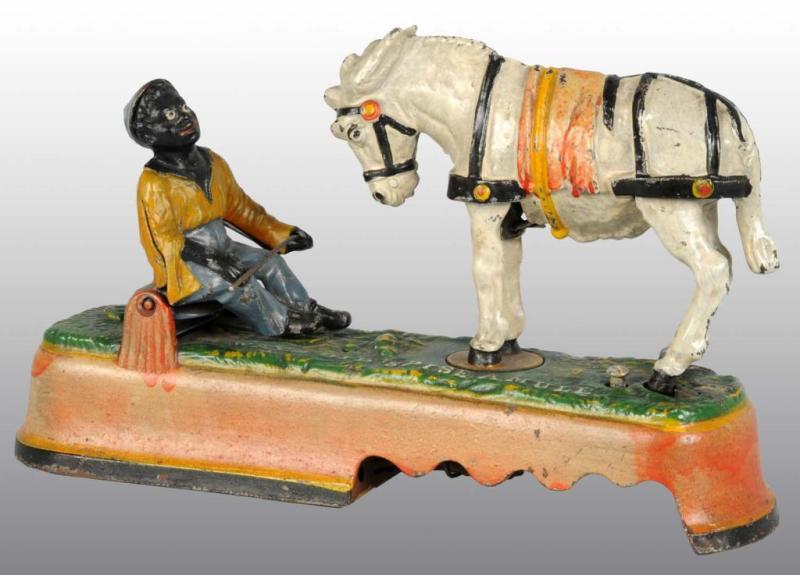 Appraisal: Cast Iron Always Did 'Spise A Mule Mechanical Bank Description