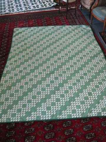 Appraisal: Handmade Quilt white triangular designs on green chintz