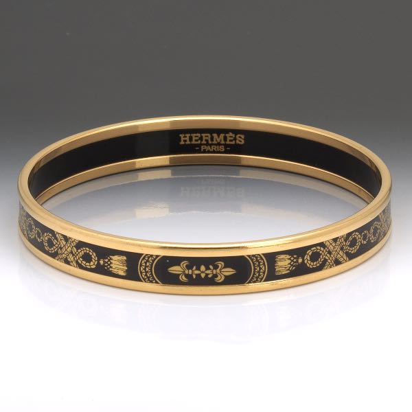 Appraisal: HERMES TASSELS NARROW ENAMEL BANGLE Size mm Dimensions mm x