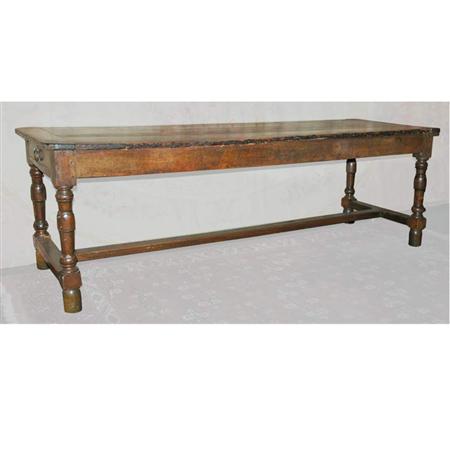 Appraisal: Continental Baroque Style Walnut Farm Table Estimate -