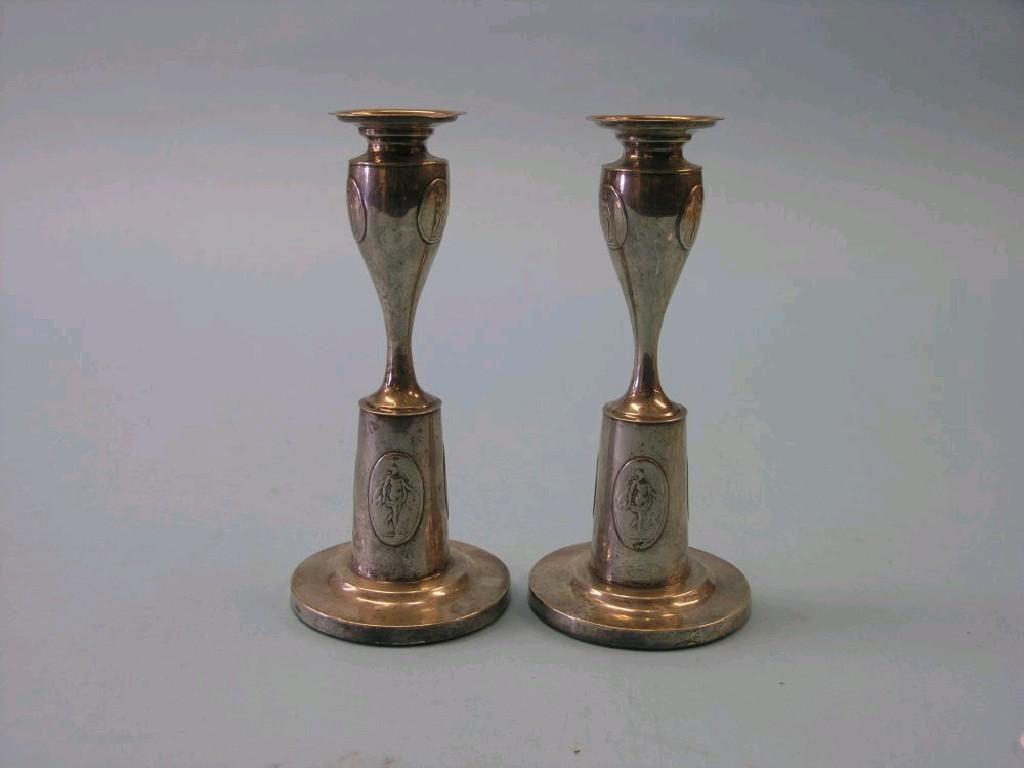 Appraisal: A pair of early th century Continental silver candlesticks relief