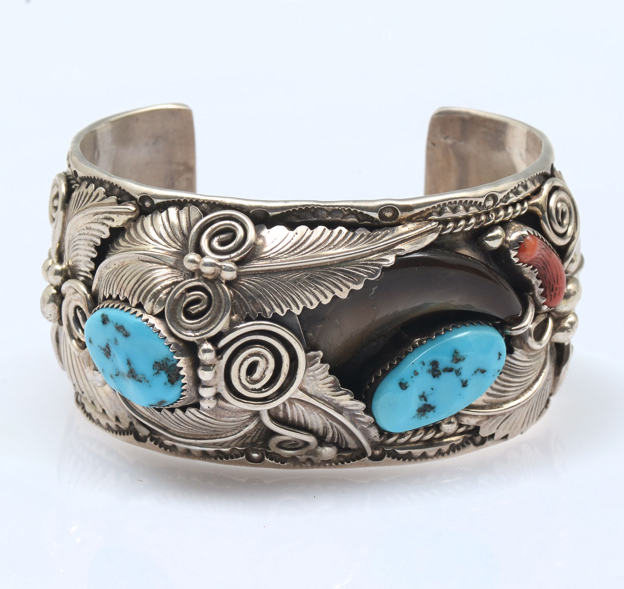 Appraisal: NAVAJO STERLING CUFF BRACELET M THOMAS JR TURQUOISE CORAL BEAR