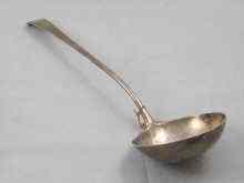 Appraisal: A Georgian silver soup ladle with feather edge by George