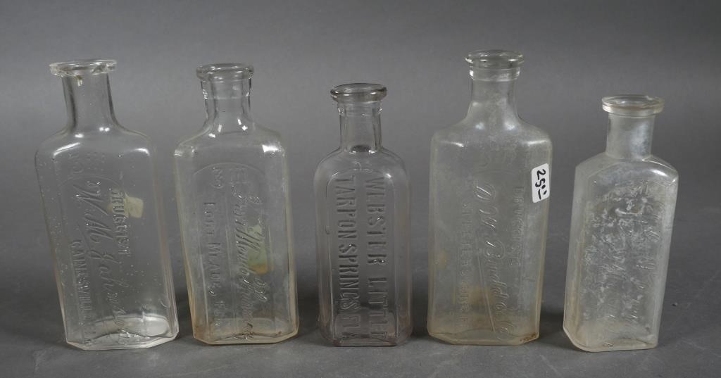 Appraisal: Five clear glass antique Florida medicine bottles Fort Meade Pharmacy