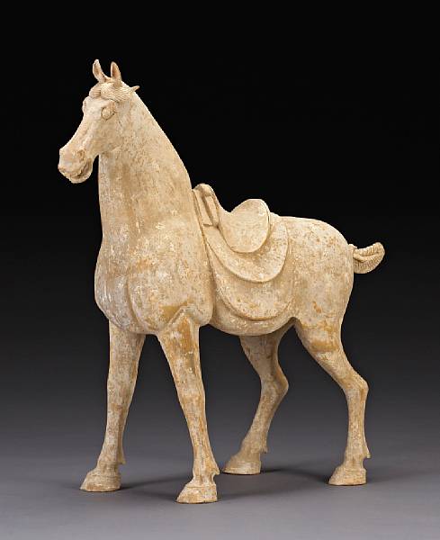 Appraisal: A massive unglazed pottery horse Tang Dynasty Modeled with its