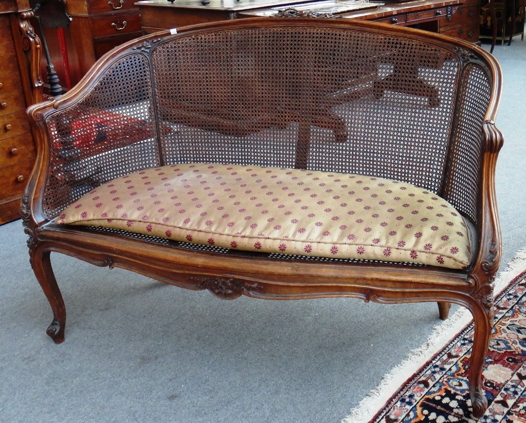 Appraisal: A th century French stained beech show frame two seat