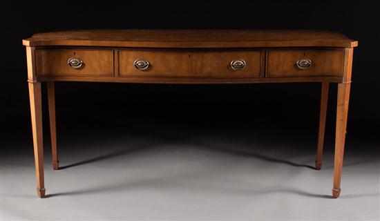 Appraisal: Kittinger Federal style carved mahogany serpentine-front serving board long drawer