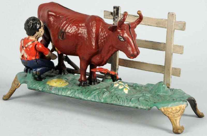 Appraisal: Cast Iron Milking Cow Mechanical Bank Manufactured by J E