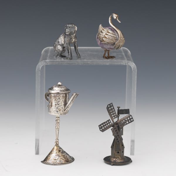 Appraisal: FOUR STERLING SILVER DOLL HOUSE GARDEN ANIMAL BIRD MINIATURES Four