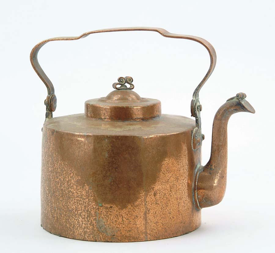 Appraisal: COPPER SWING HANDLE TEAPOT Dovetailed construction removable lid with scroll