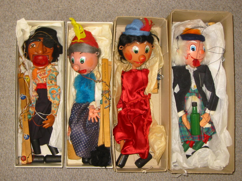 Appraisal: Four Pelham puppets SM Pirate SM Old Woman with Pail