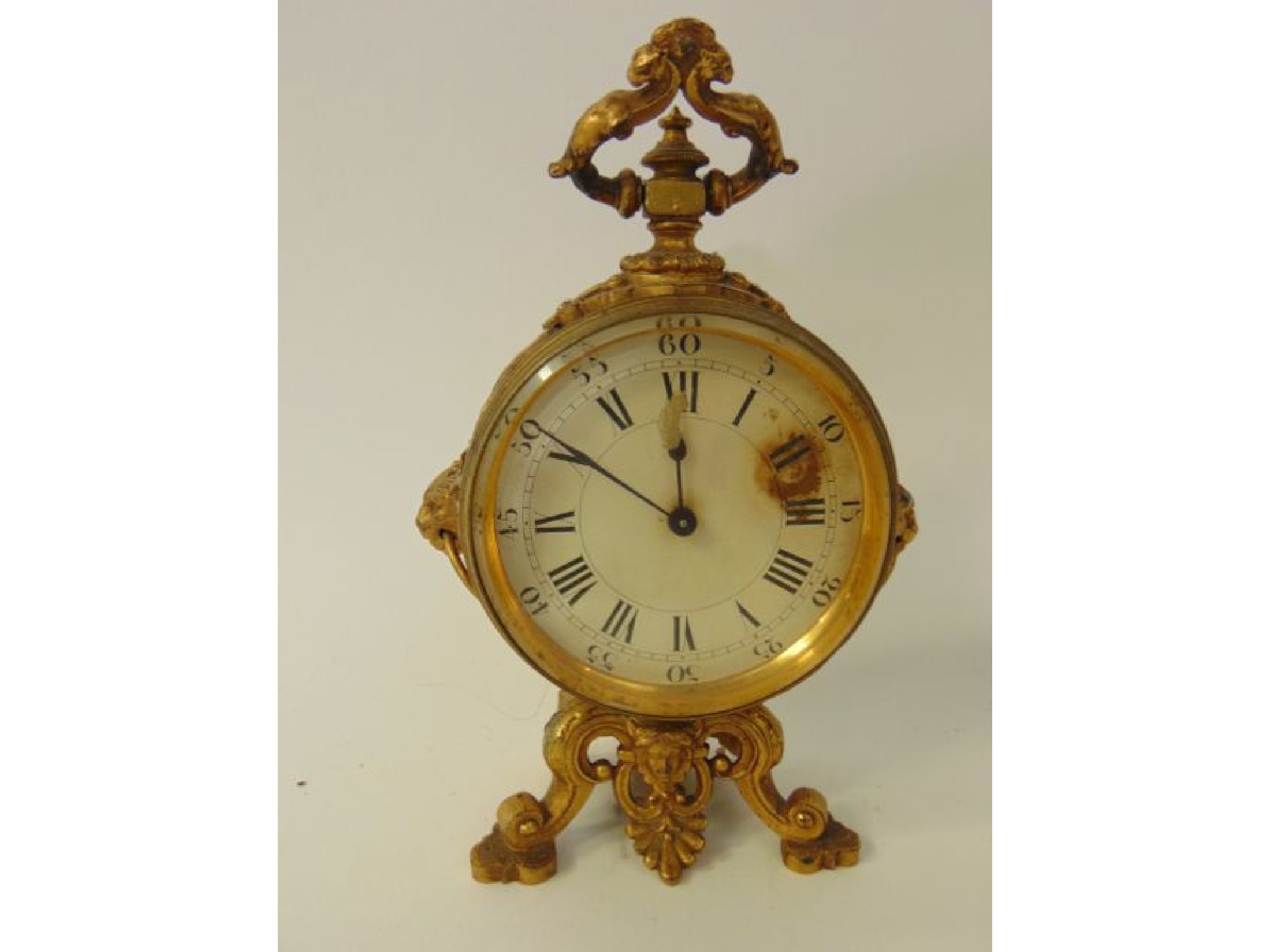 Appraisal: A th century gilded brass mantle clock the circular case