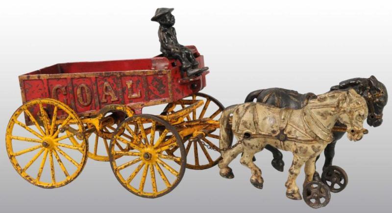 Appraisal: Cast Iron Hubley Horse-Drawn Coal Wagon Toy Description Pulled by