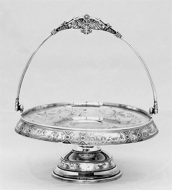 Appraisal: Reed Barton silverplate cake basket circa fancy pivoting handle on