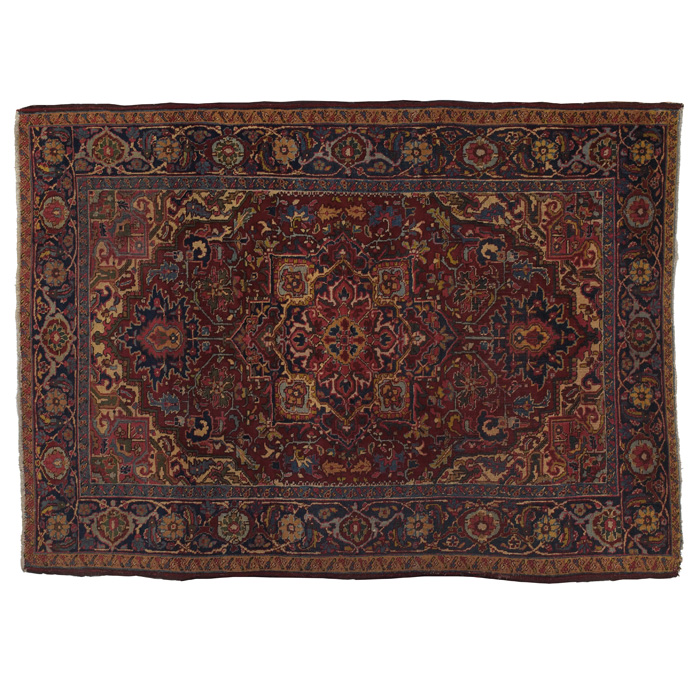 Appraisal: Persian Heriz rug c floral design with central medallion on