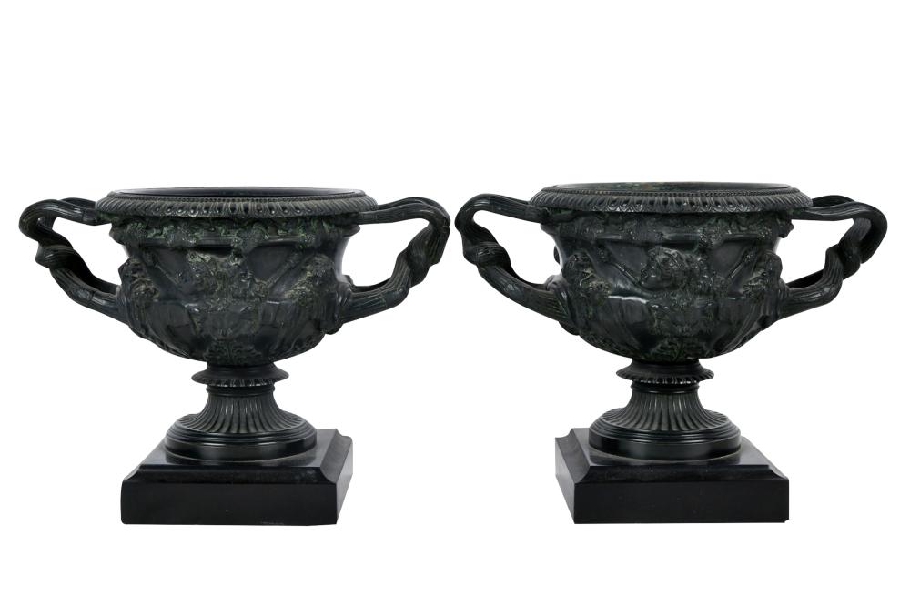 Appraisal: PAIR OF PATINATED BRONZE CACHE POTSeach on a slate base