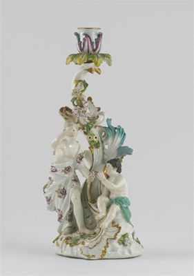 Appraisal: A Meissen candlestick group modelled with two Classical figures the