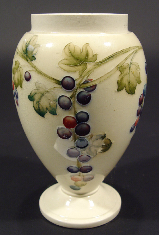 Appraisal: Moorcroft baluster vase hand painted and tubelined with leaves and