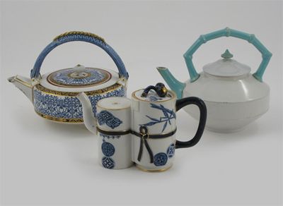 Appraisal: A Royal Worcester Aesthetic Movement teapot and cover twin bamboo