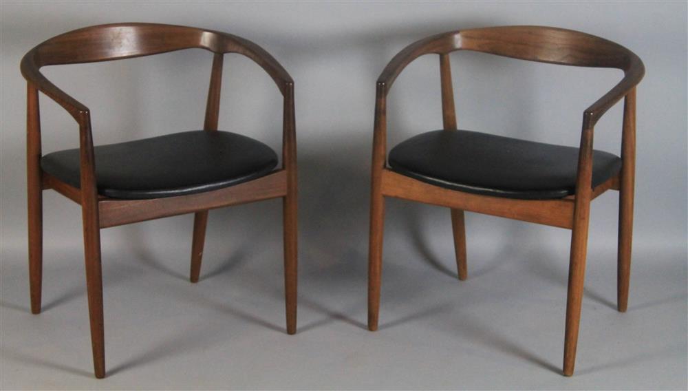 Appraisal: PAIR OF HANS WEGNER-STYLE CHAIRS with teak frames and black