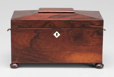 Appraisal: Rosewood tea box sarcophagus form interior with two lidded compartments