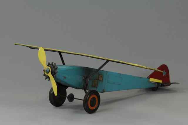 Appraisal: THE RIGHT PLANE Schieble large scale lithographed tin single propeller