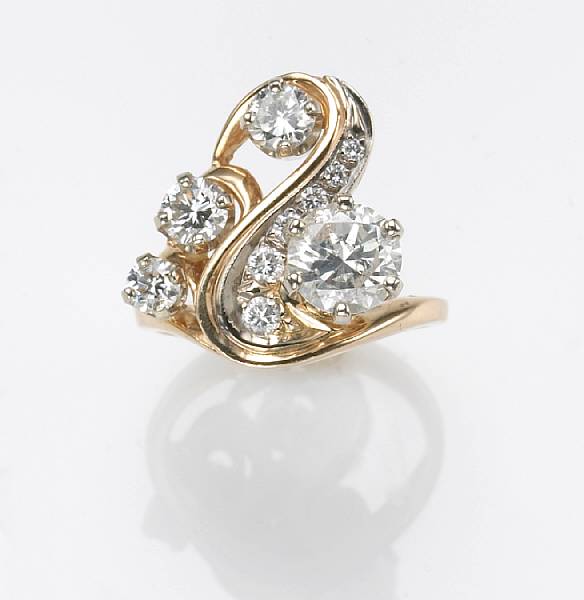 Appraisal: A diamond and k gold ring center diamond weighing an