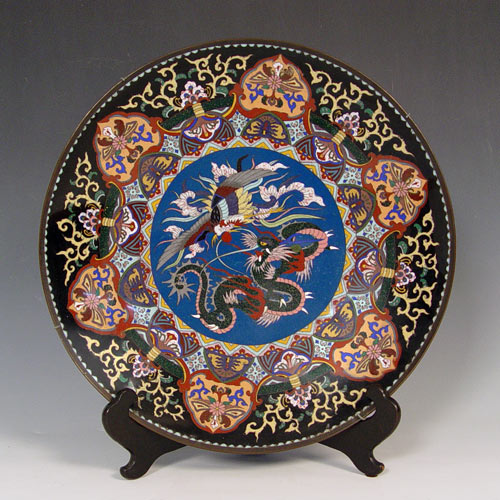 Appraisal: MEIJI PERIOD JAPANESE GOLDSTONE CLOISONNE CHARGER Central dragon and phoenix