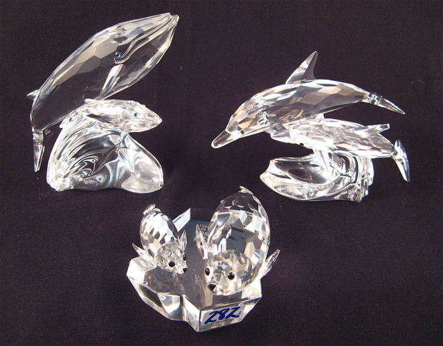 Appraisal: THREE SWAROVSKI CUT CRYSTAL FIGURES from the Mother and Child