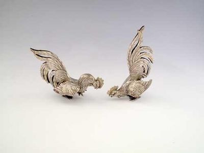 Appraisal: A pair of cast continental fighting cocks with English import