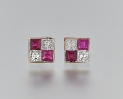 Appraisal: A Pair of Ruby and Diamond Earrings k yellow gold