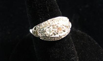 Appraisal: Platinum and diamond cluster ring th century Set with three