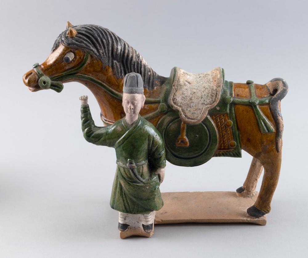 Appraisal: CHINESE SANCAI GLAZE POTTERY HORSE AND GROOM POSSIBLY TANG DYNASTY