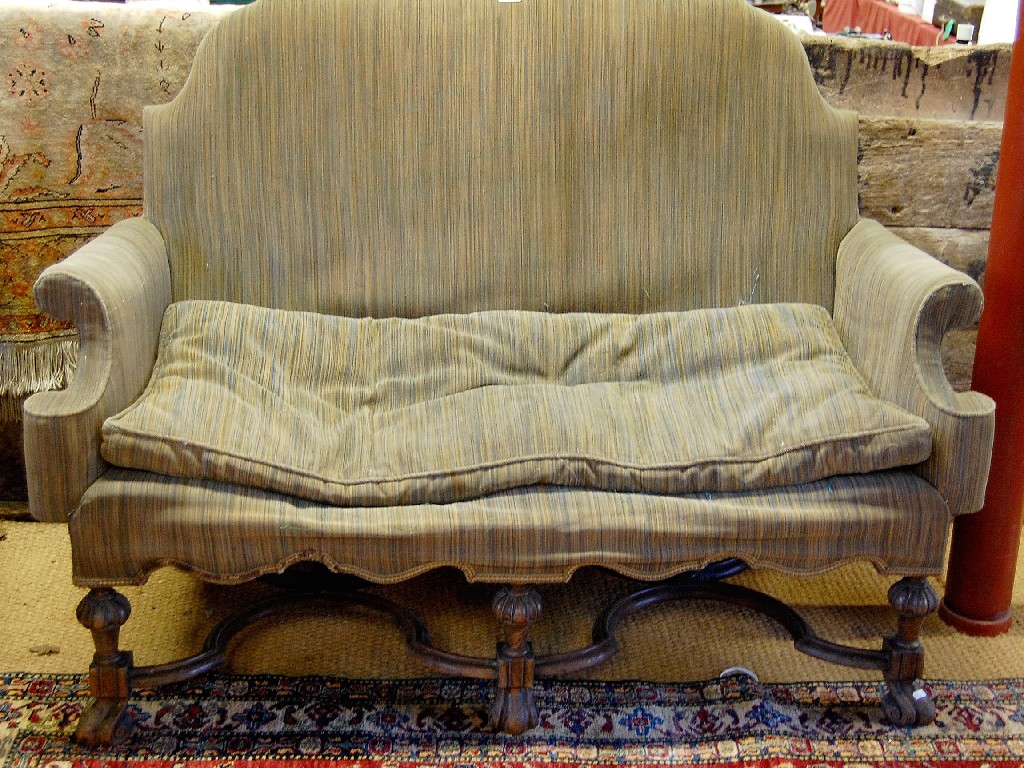 Appraisal: A th century style scroll arm walnut framed sofa raised