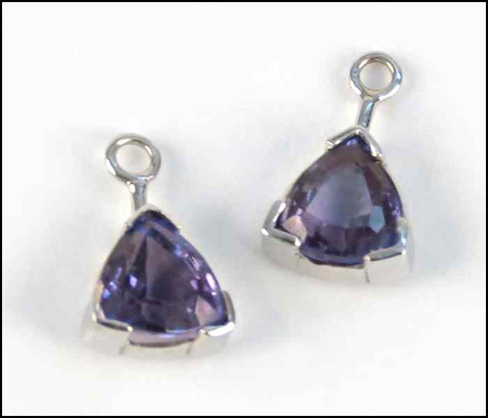 Appraisal: PAIR OF TANZANITE AND WHITE GOLD DROPS Condition No Specific