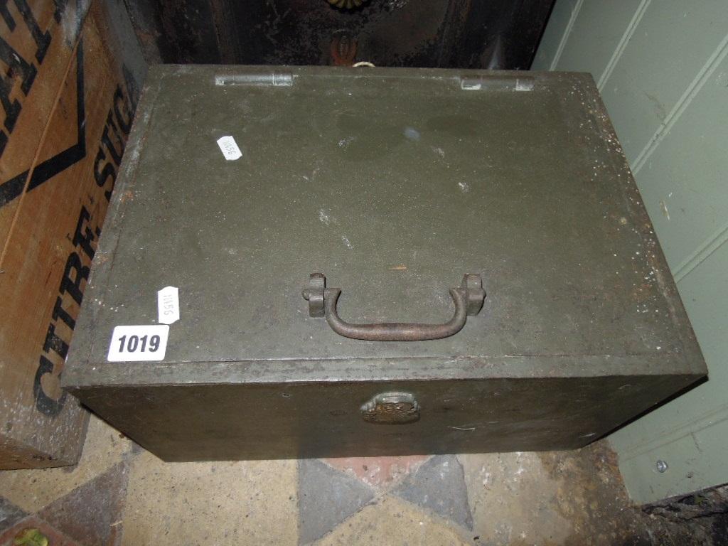 Appraisal: A small Chubb cast iron strongbox with iron work carrying