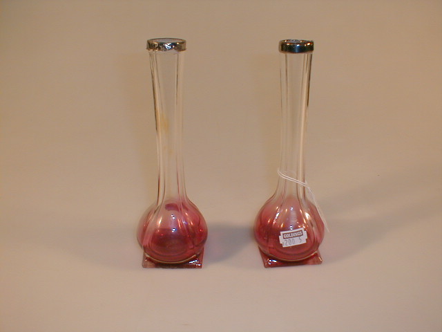 Appraisal: A pair of bud vases of bulbous form with stretched