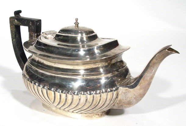 Appraisal: Queen Anne style silver teapot with ebony handle cream jug