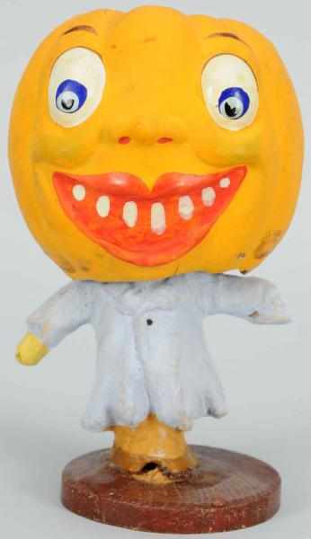 Appraisal: Halloween Pumpkin Head Nodder Marked Germany Condition Excellent Size -