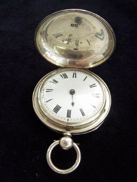 Appraisal: A gentleman's hunter pocket watch the white dial with Roman