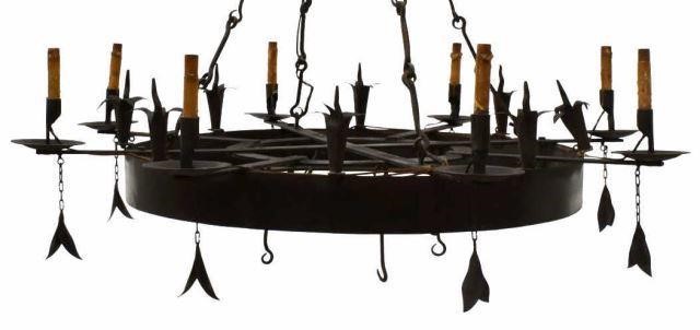 Appraisal: Gothic style wrought iron eight-light chandelier early th c hanging