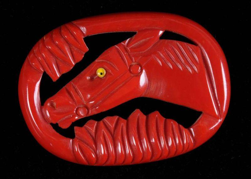 Appraisal: Bakelite Red Horse Pin Condition Near Mint Size L